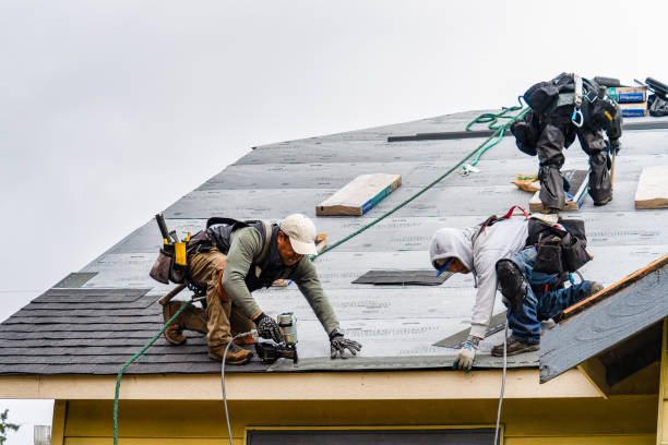 Professional Gutter Installation technician working in East Hampton, CT